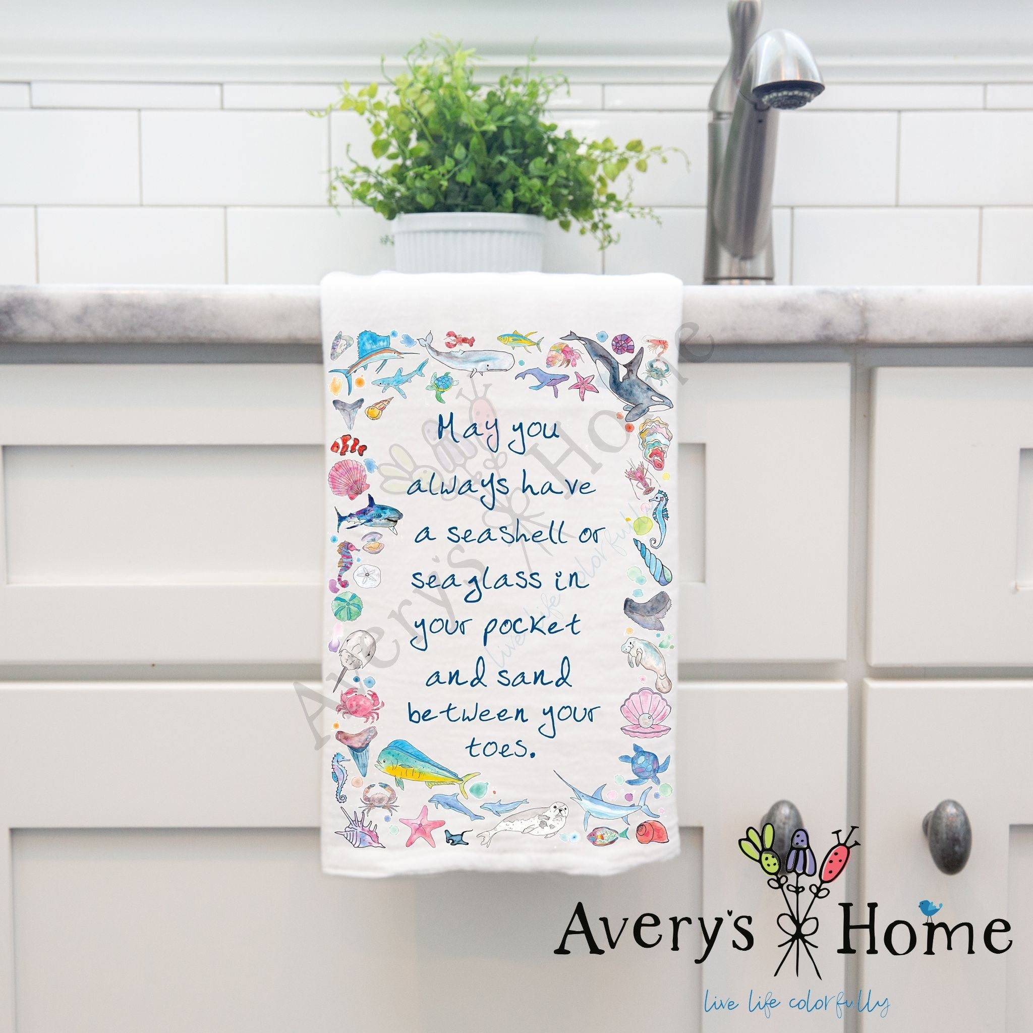 Ocean Blessing dish towel hanging in the kitchen
