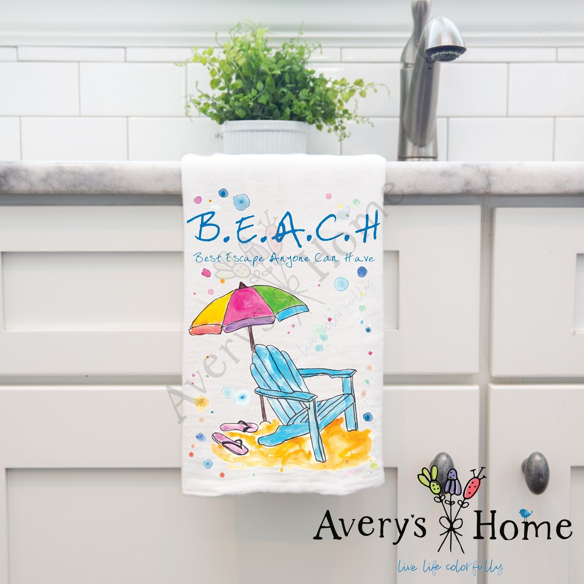 Beach Vacation dish towel hanging in the kitchen