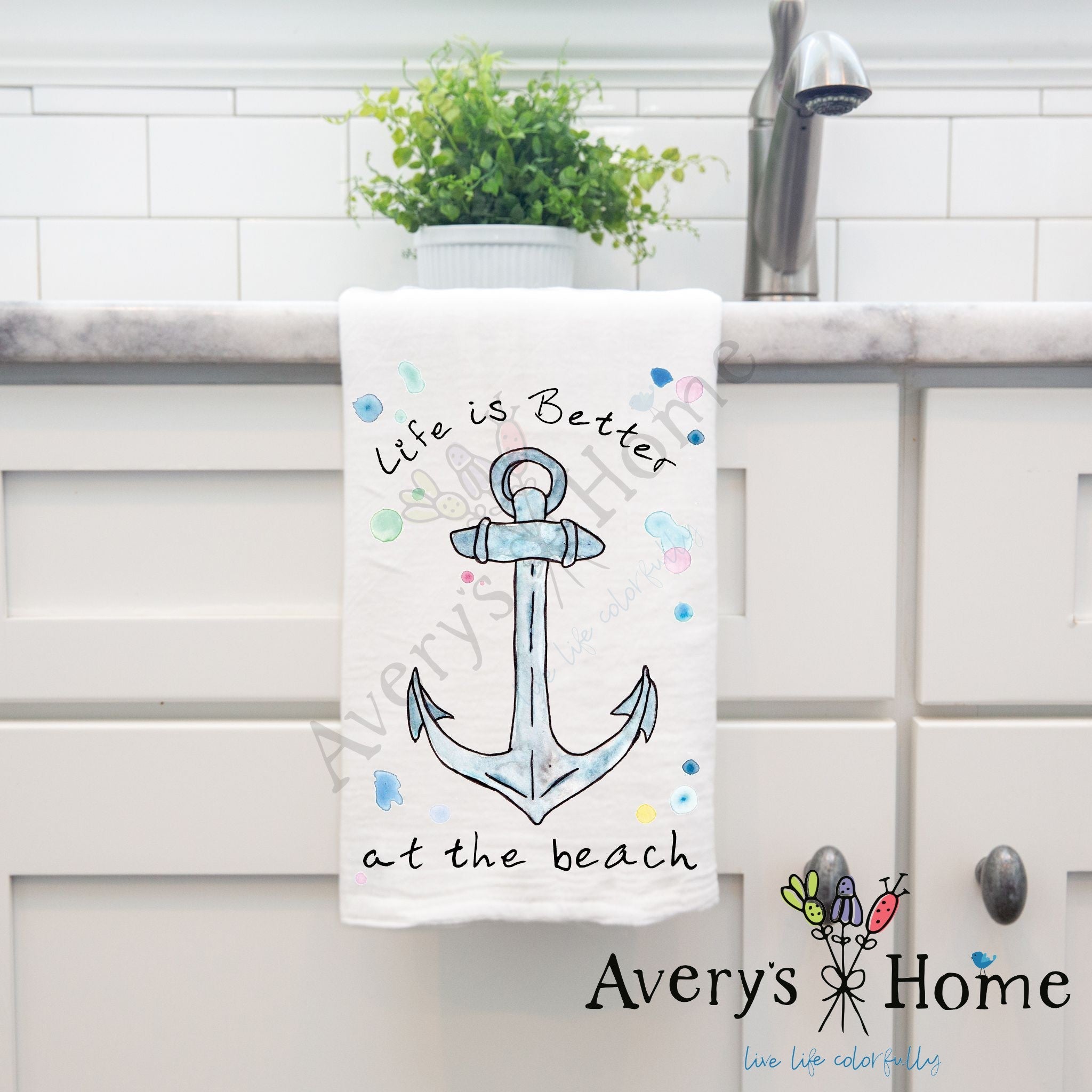 Life is Better at the Beach Anchor dish towel hanging in the kitchen