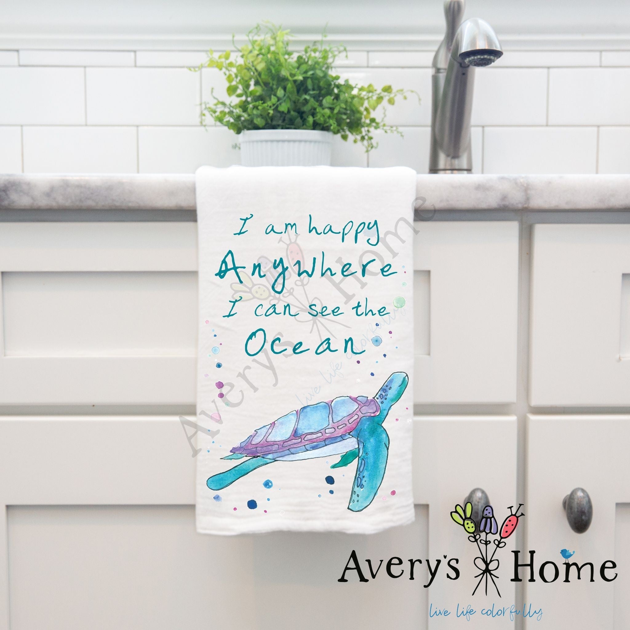 I am Happy Anywhere…Ocean Turtle dish towel hanging in the kitchen