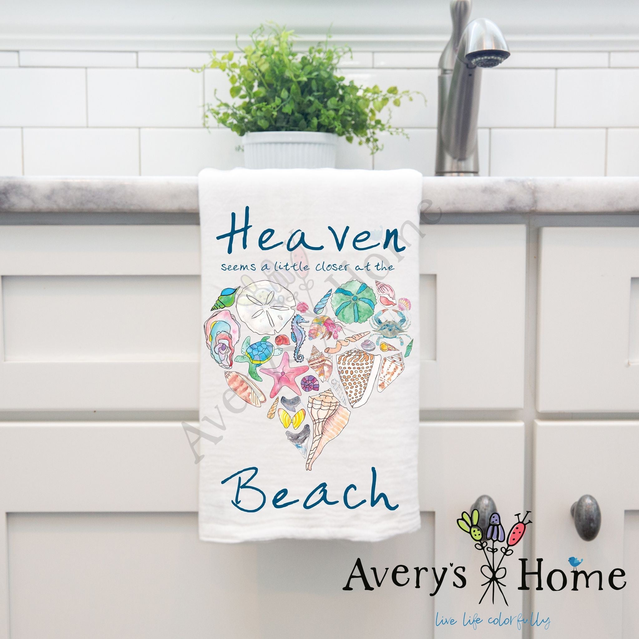 Heaven At the Beach dish towel hanging in the kitchen