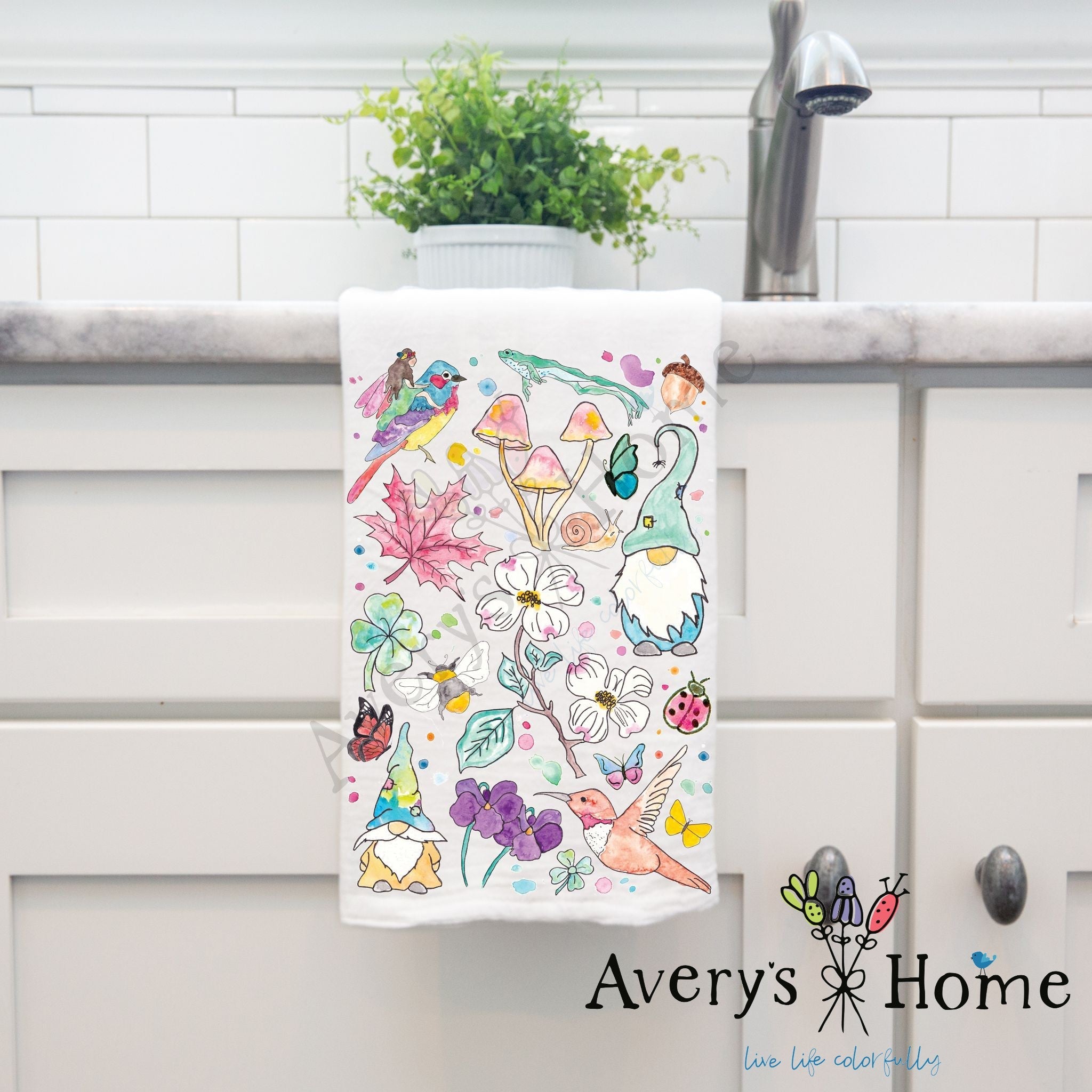 Garden Gnomes & Mushrooms dish towel hanging by kitchen sink