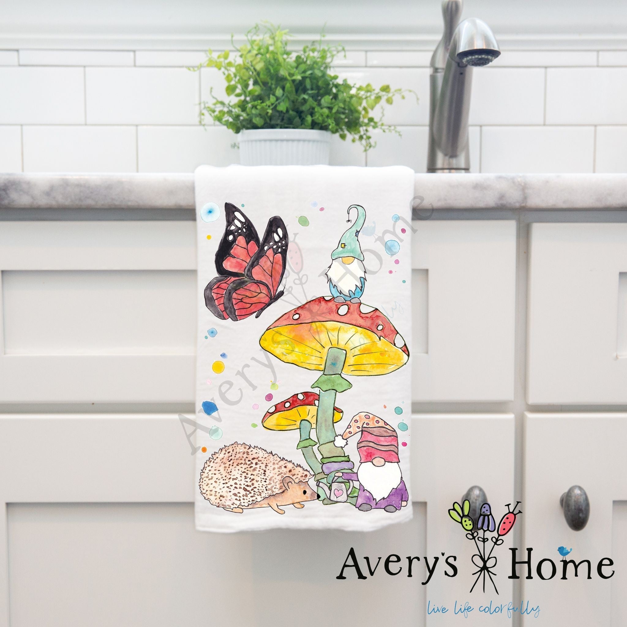 Gnome and Hedgehog dish towel hanging in the kitchen