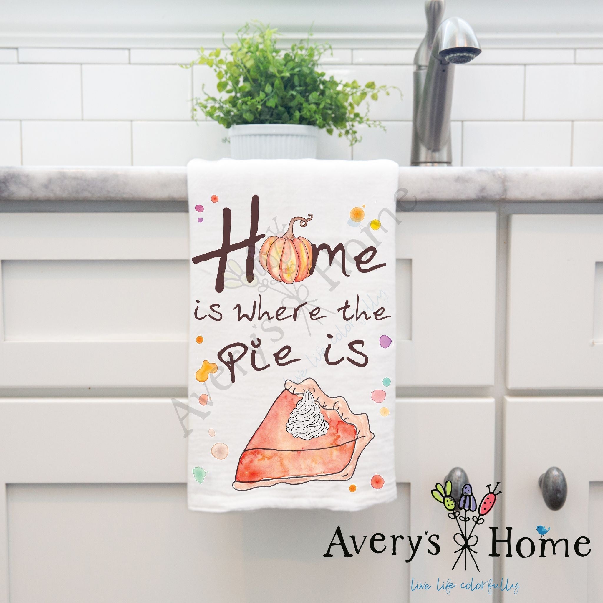 Home is Where the Pie is Thanksgiving dish towel hanging by kitchen sink