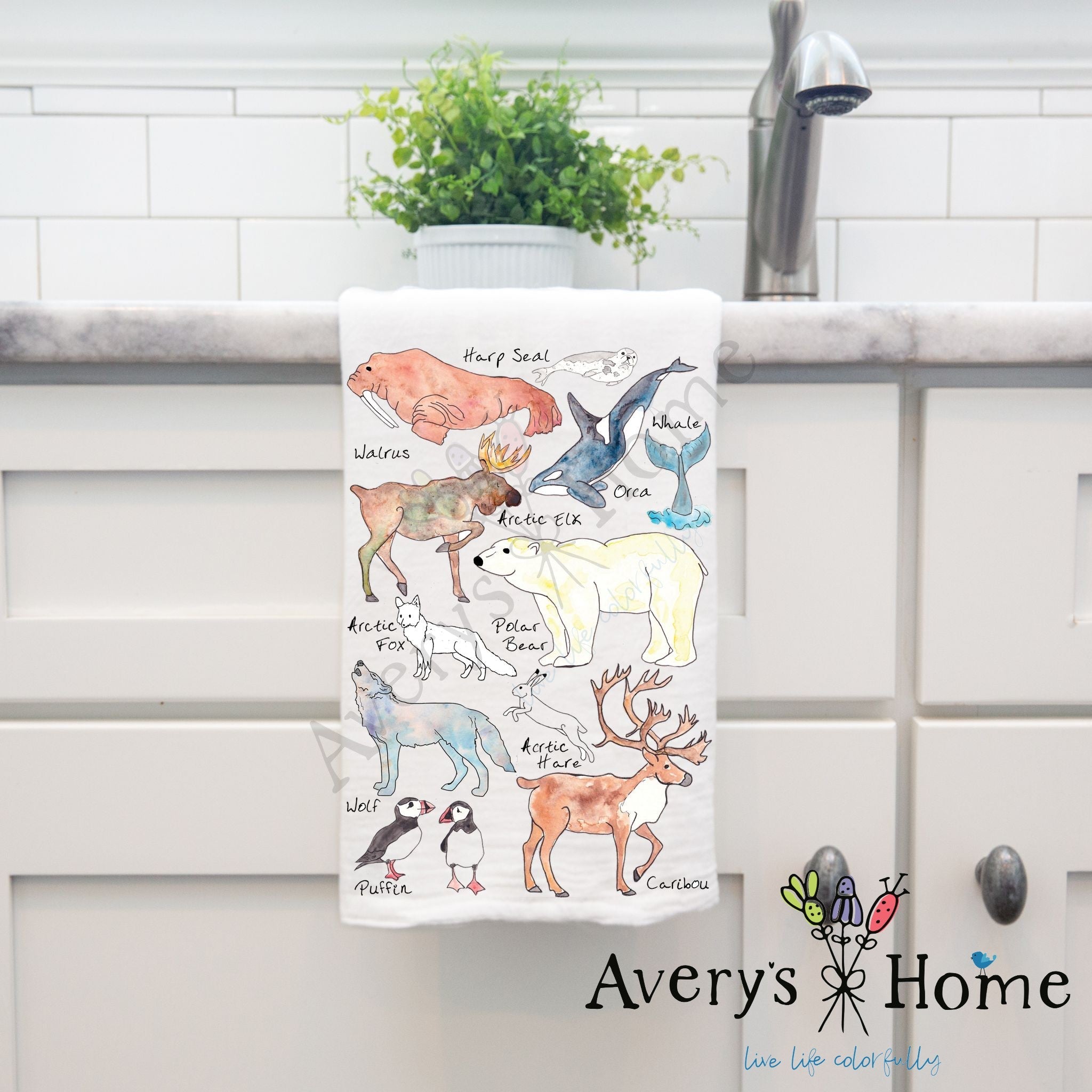 Arctic Wildlife dish towel hanging by kitchen sink