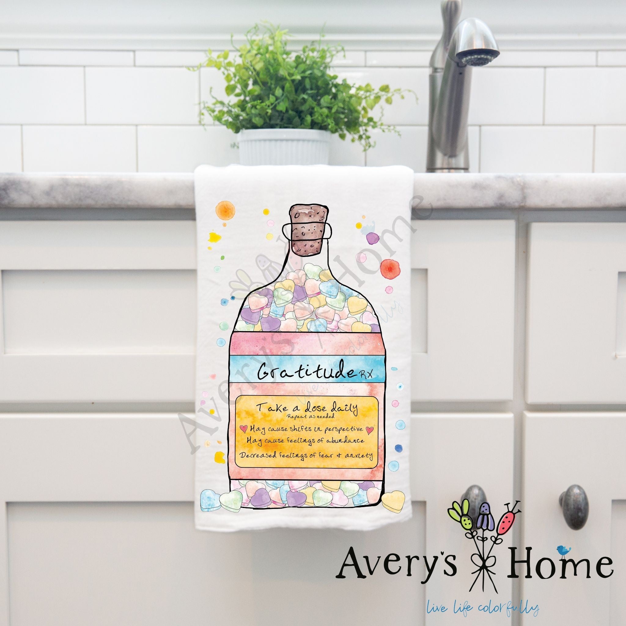 Gratitude In a Bottle dish towel hanging by kitchen sink