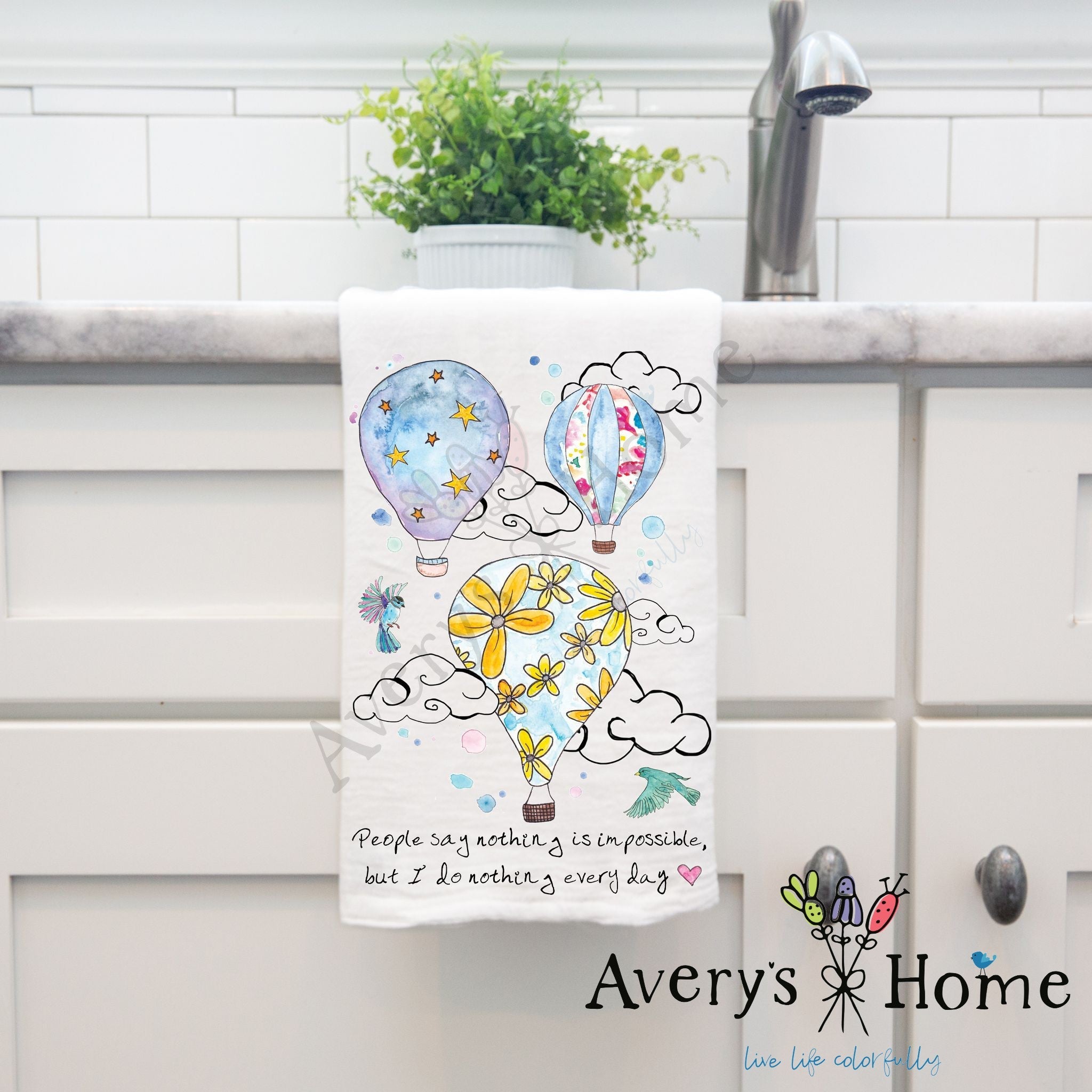 Hot Air Balloon Quote dish towel hanging in the kitchen
