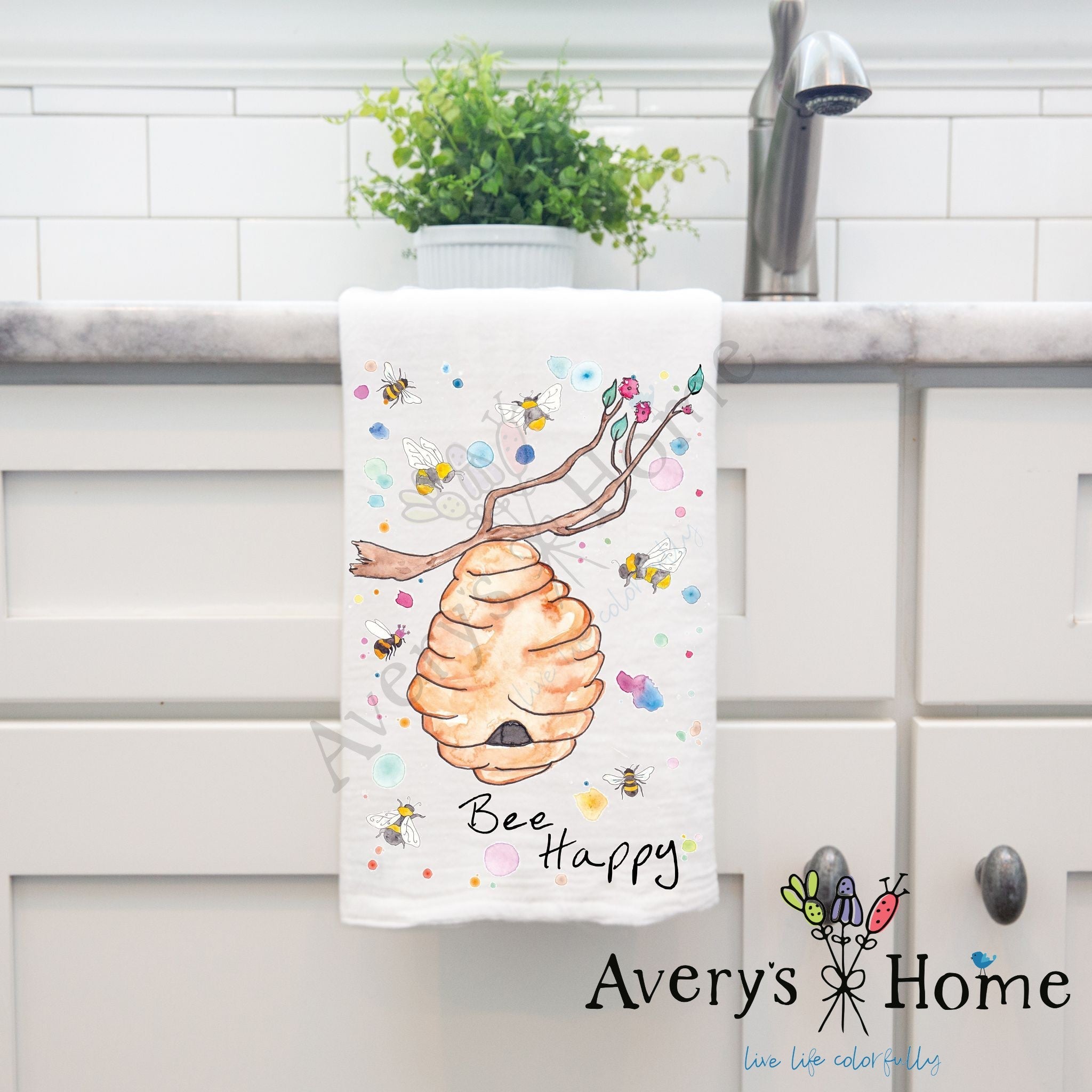 Bee Happy dish towel hanging by kitchen sink