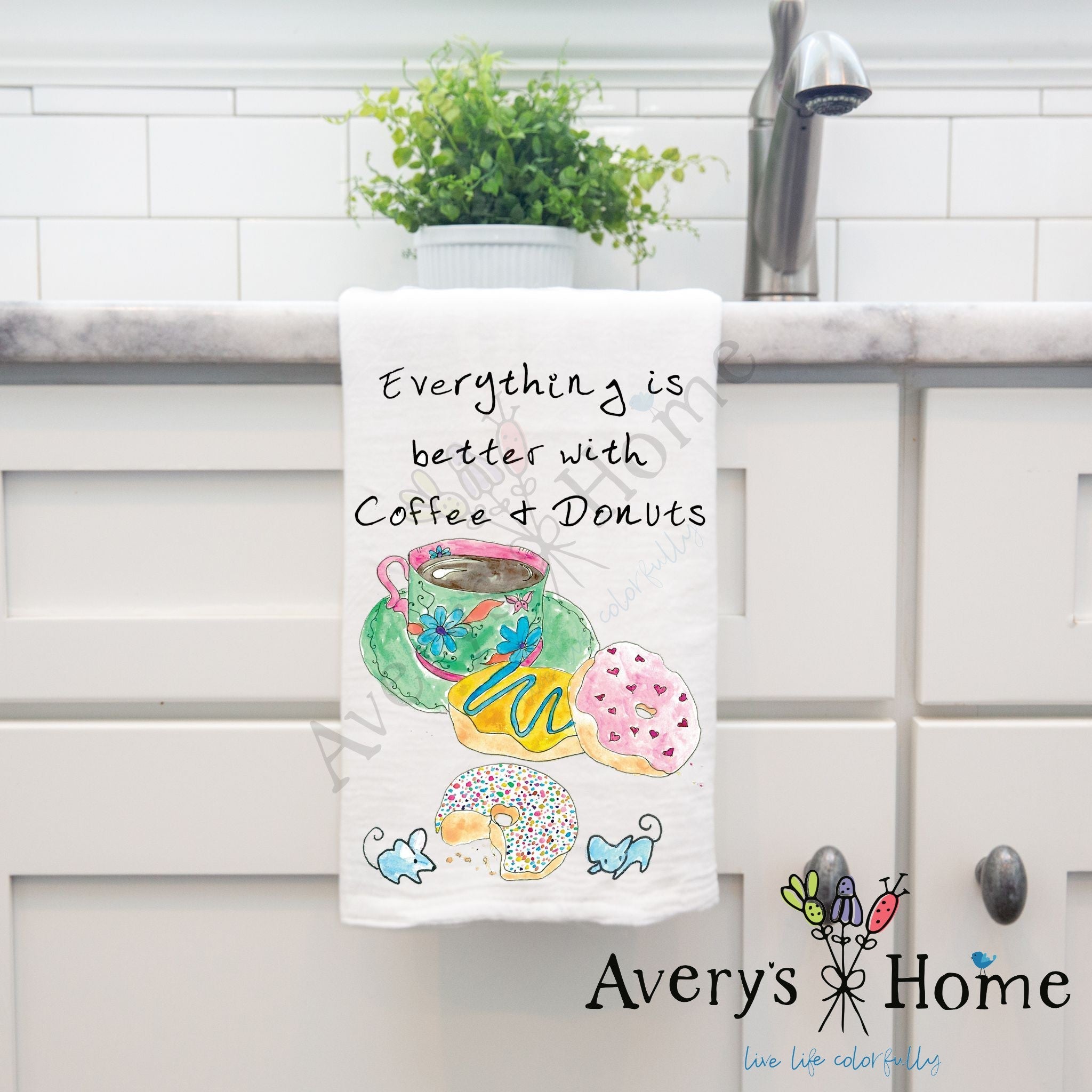 Coffee & Donuts dish towel hanging by kitchen sink