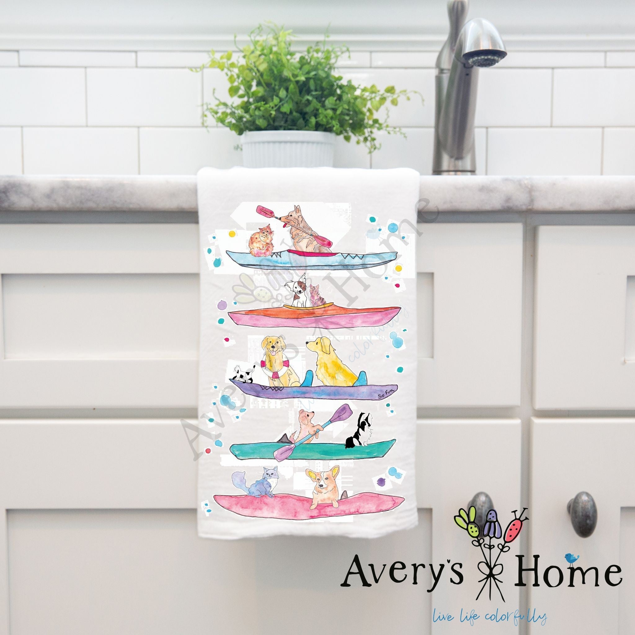 Dogs Kayaking dish towel hanging by kitchen sink