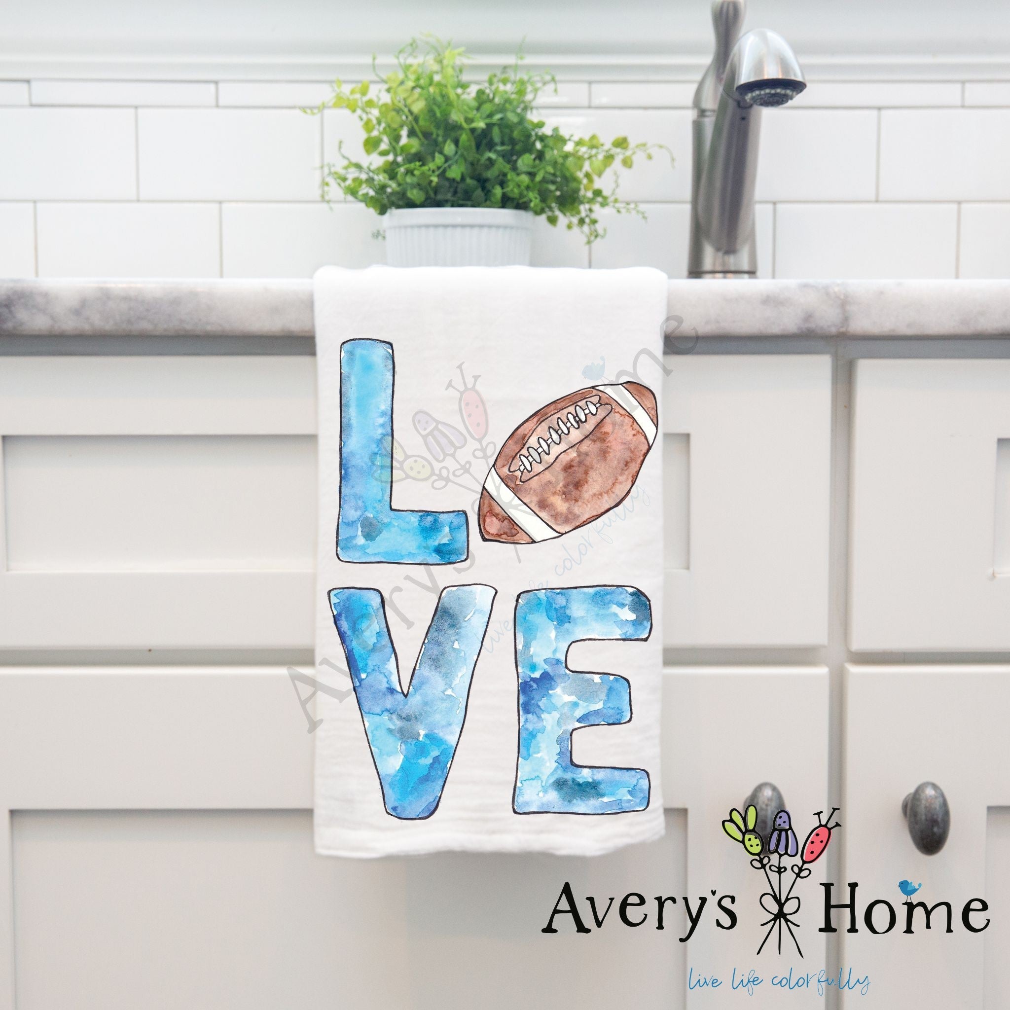 Football LOVE dish towel hanging by kitchen sink