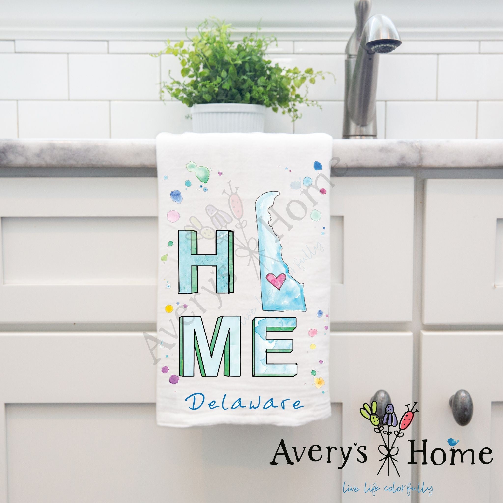 HOME in Delaware dish towel hanging by kitchen sink