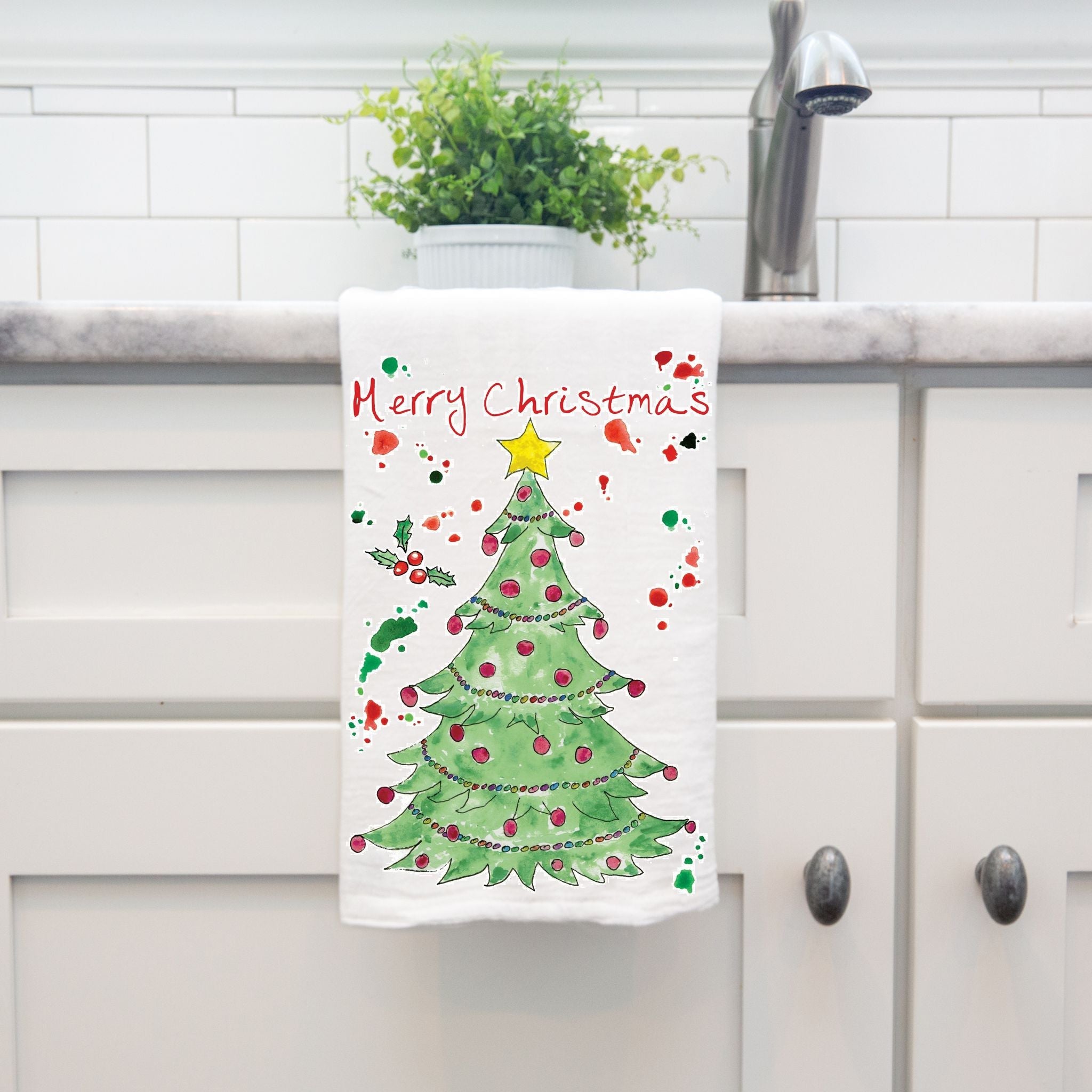 Christmas Tree dish towel hanging by kitchen sink