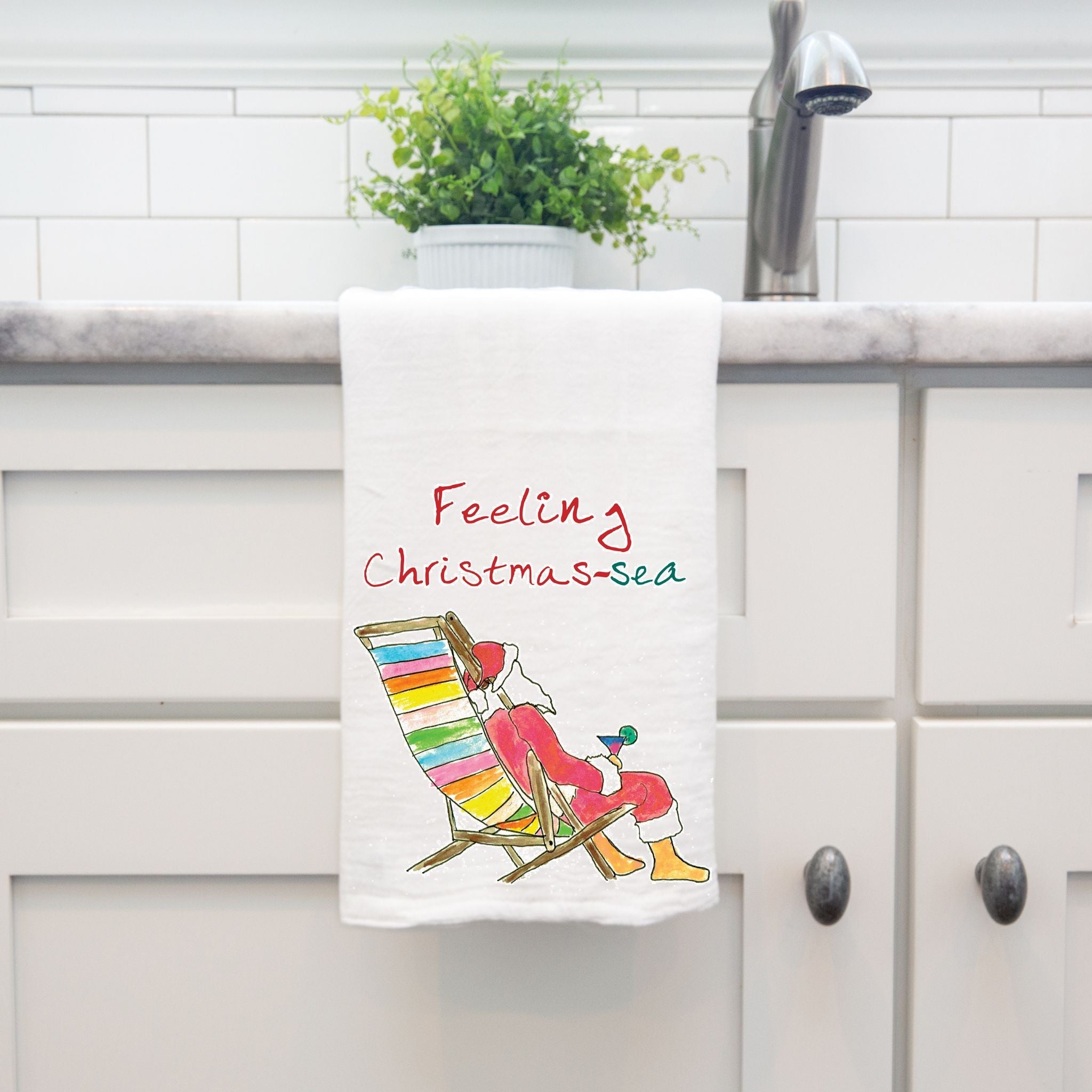 Feeling Christmas-Sea dish towel hanging by kitchen sink