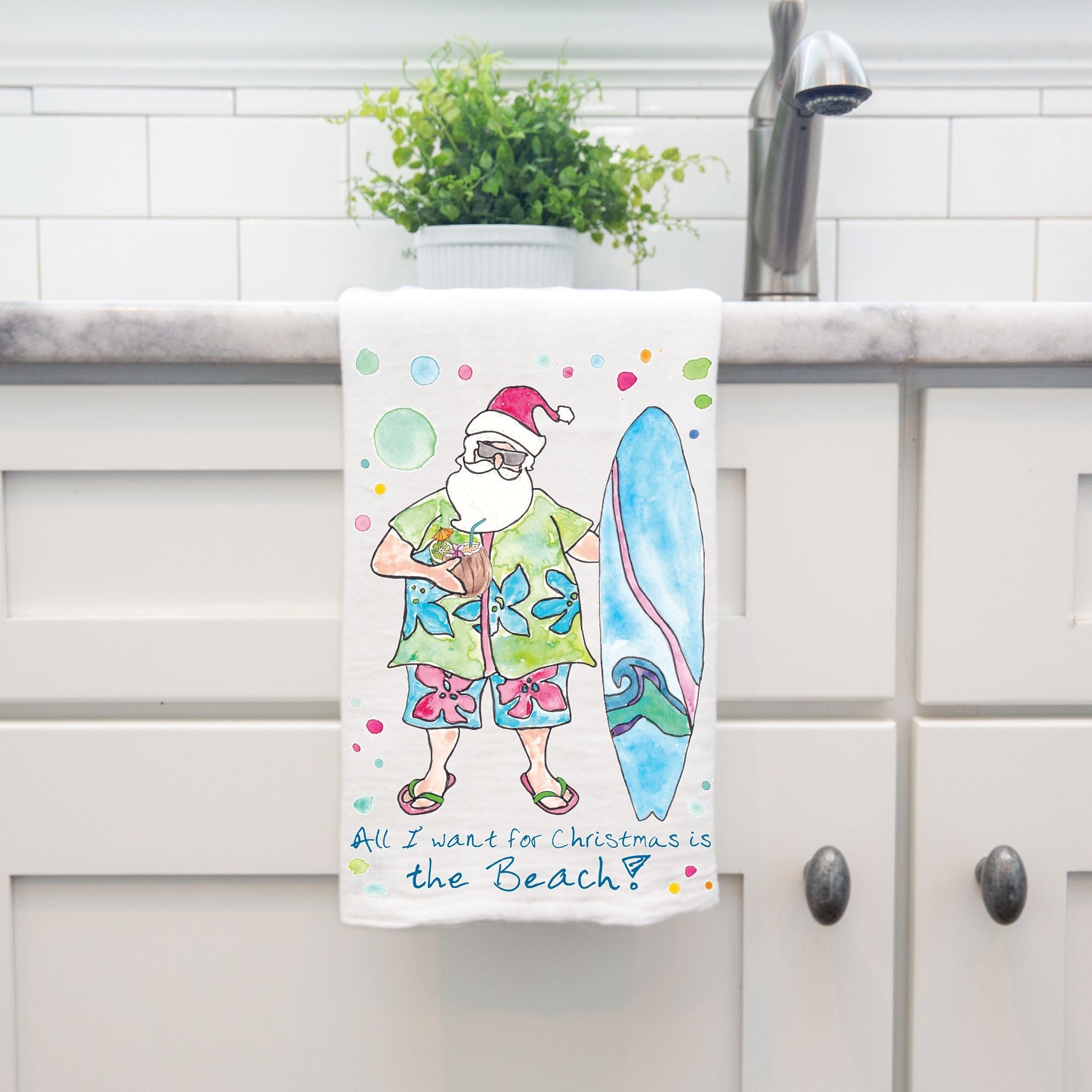 All I Want for Christmas is the Beach dish towel hanging by kitchen sink