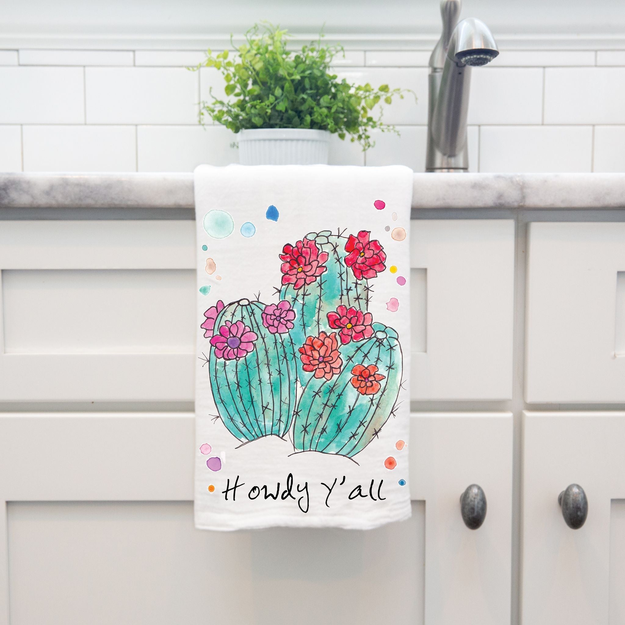 Howdy Y'all Cactus dish towel hanging by kitchen sink