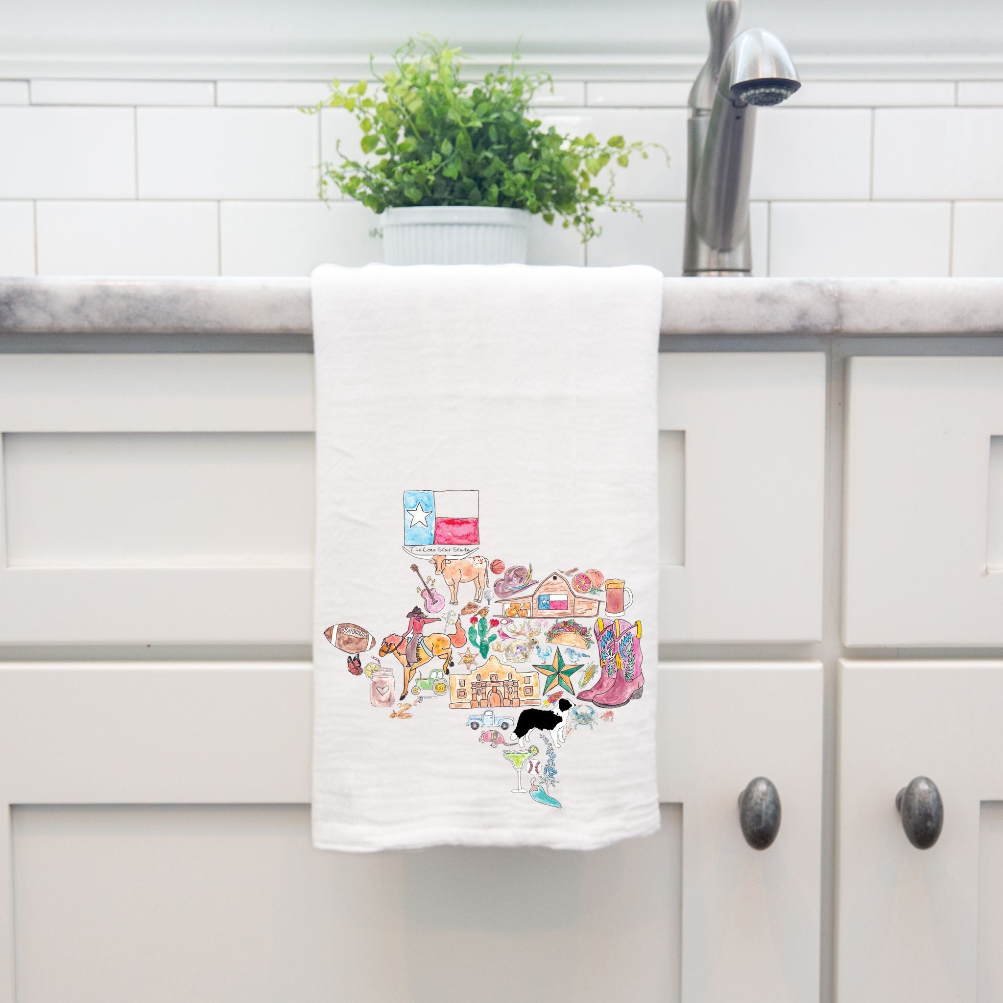 Texas State Icons dish towel hanging in the kitchen