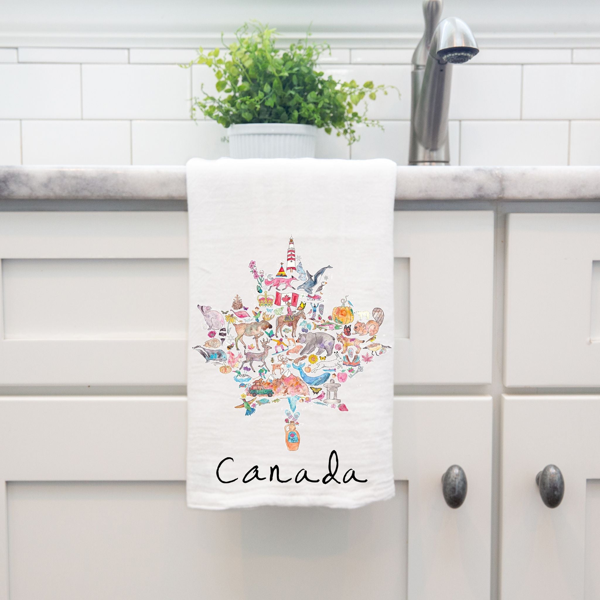 Canada Maple Leaf Icons dish towel hanging by kitchen sink