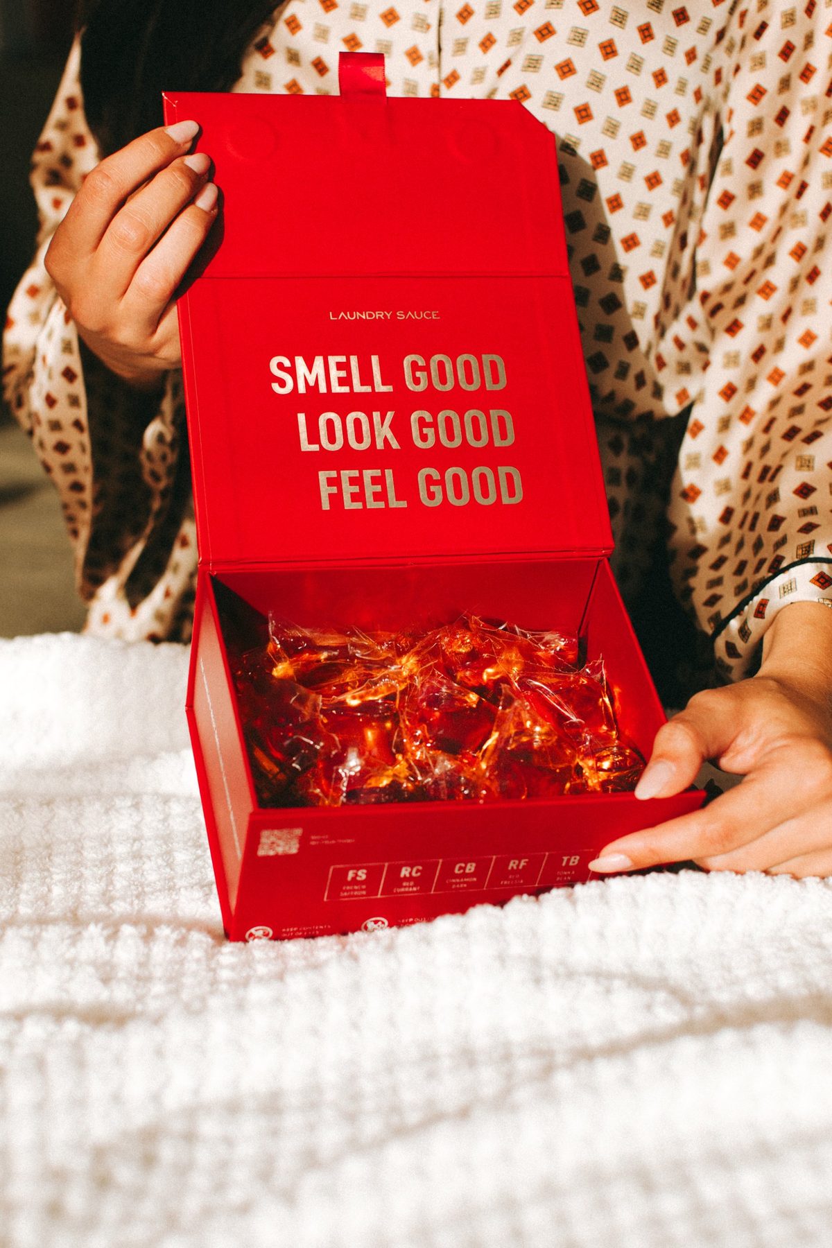 Laundry Sauce scented laundry detergent pods in a red gift box